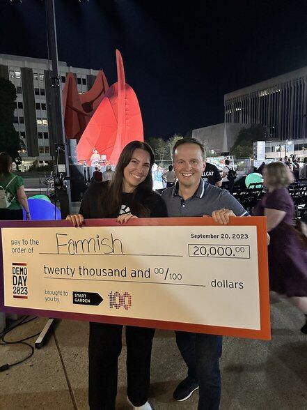 Terra Osman, Founder, and Daniel Morrison, CTO, holding Farmish’s $20,000 Start Garden Demo Day check in 2023